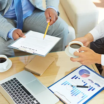 Discussion with an agent showing a report