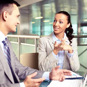 Two businessperson having a discussion about an LLC