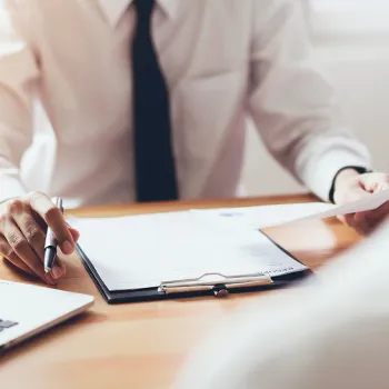 A man thinking about his business being redomisticated