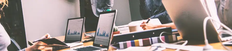 A man typing the steps of dissolving an Arizona LLC