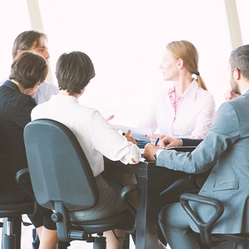 A group of employees discussing a dissolving an LLC in Montana