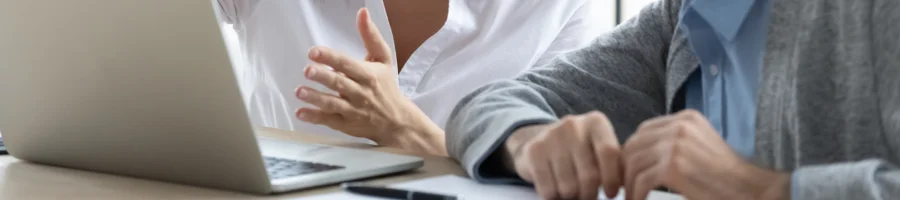 A man discussing to his colleague about California LLC approval timeline