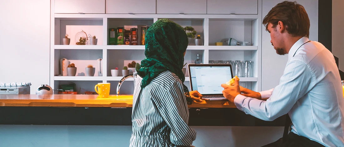 Venture Smarter | How to Look Up an LLC in Florida? (Step by Step Guide) Two employees looking up an LLC in Florida