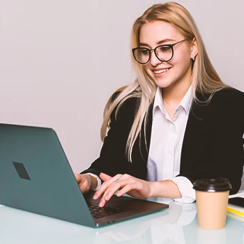 A registered agent working on a laptop