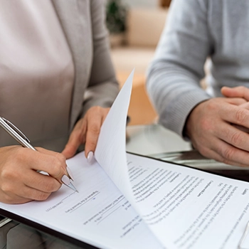 An owner writing signature