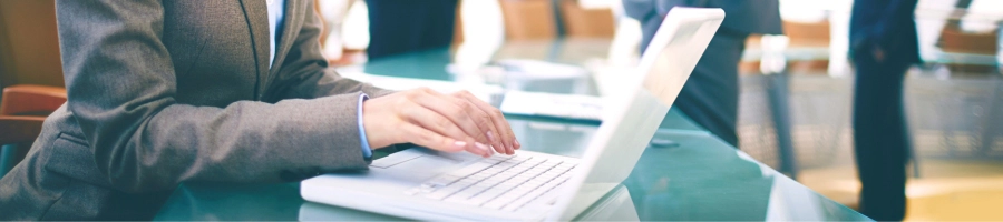Person in front of computer changing their registered agent online