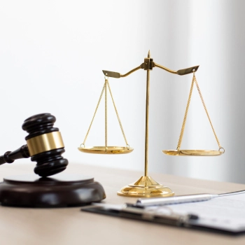 Legal gavel on table to show a legal document for a registered agent