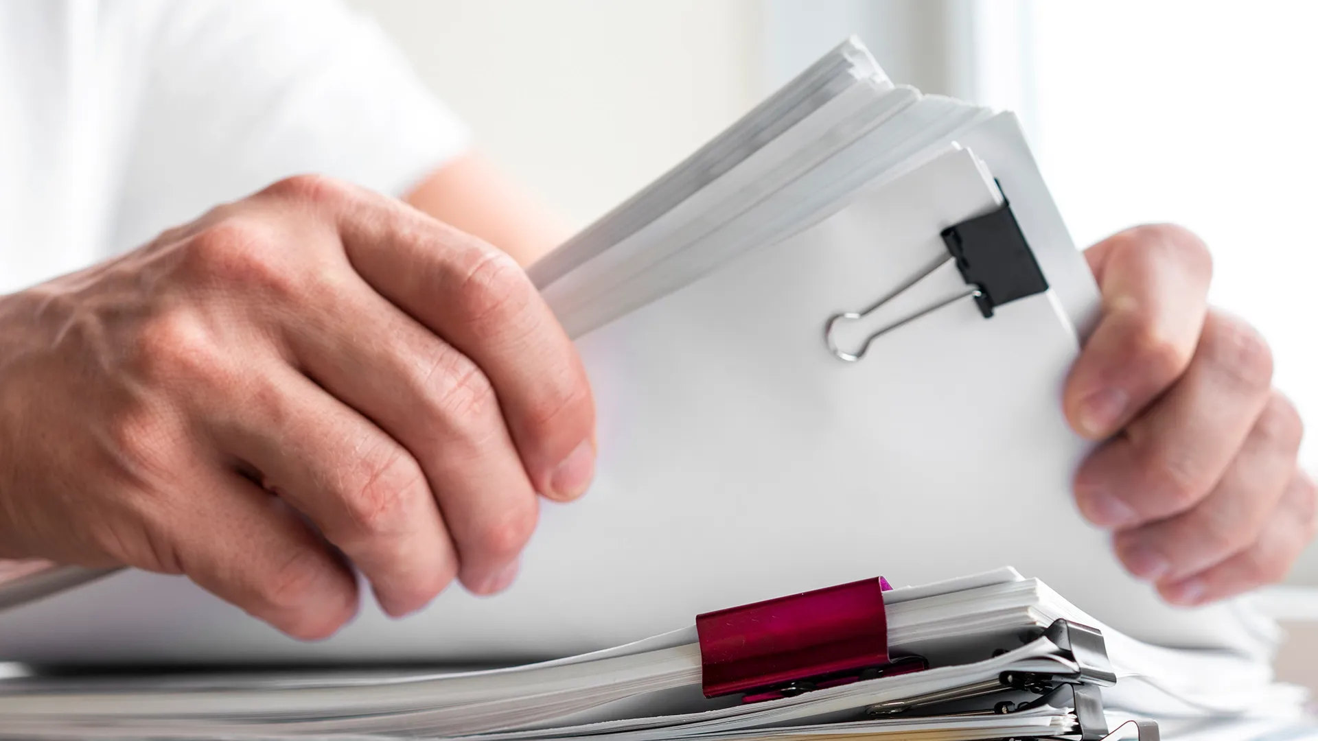 Venture Smarter | How To Change an LLC Name in Nebraska? (Full Guide) Holding documents on changing an LLC name in Nebraska