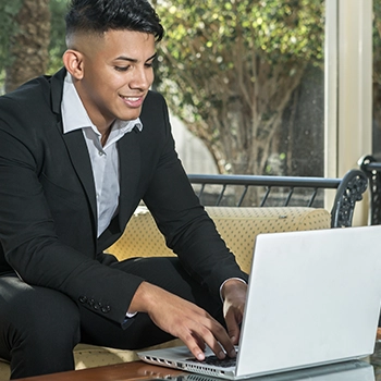 Using a laptop to file documents