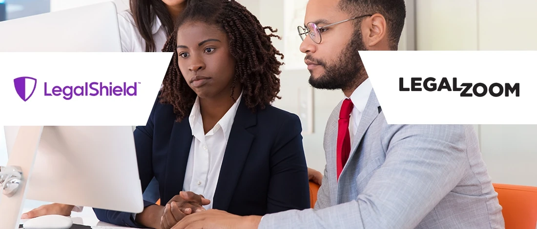 Busy and serious businesspeople reviewing LegalZoom and LegalShield