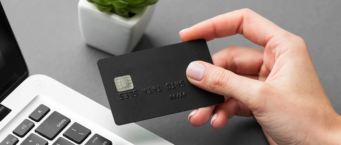 Venture Smarter | How To Build Business Credit Fast? (Most Efficient Methods) Holding on a business credit card while thinking how to build business credit fast