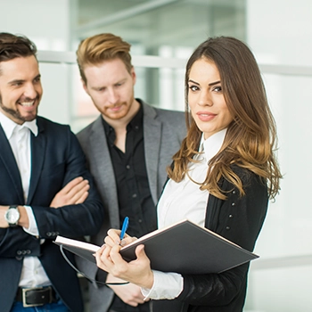 Woman holding a document with sales tax data