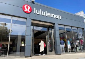 Venture Smarter | Lululemon Cuts Guidance After Product Launch Fumble, Misses Sales Estimates A customer entering Lululemon