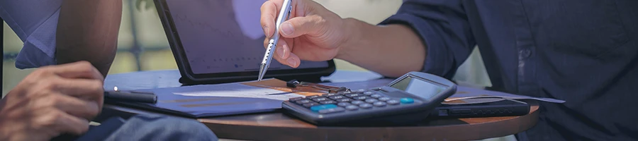 TurboTax workers discussing the Services, Features and Prices